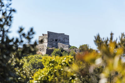 Low angle view of historical building against sky