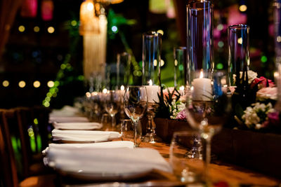 Luxury table settings for fine dining with and glassware, beautiful blurred background. 