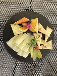High angle view of food on table cheese and fruits 