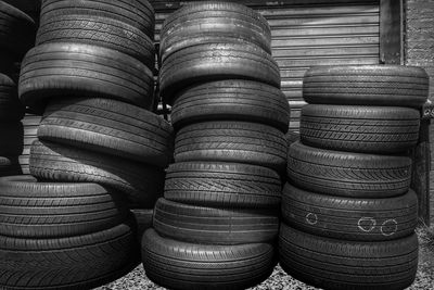 Black and white shot of pyle of tyres