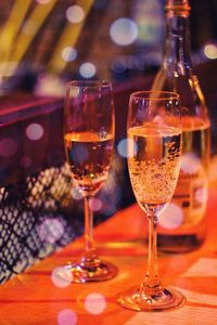 Close-up of wine in glass on table