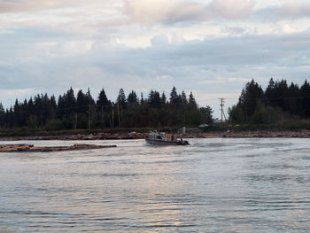 Scenic view of river against sky