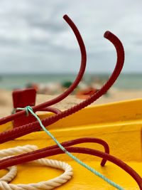 Close-up of rope against sea