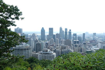 View of modern buildings against clear sky