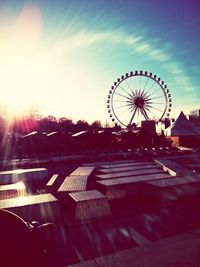 Low angle view of ferris wheel against sky