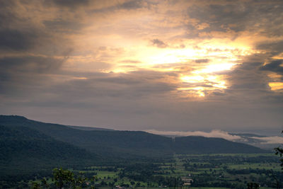 Scenic view of landscape against sky during sunset