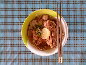 Directly above shot of noodles in bowl on table