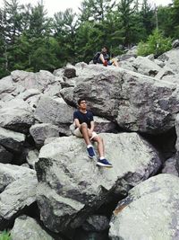 Woman standing on rock formation