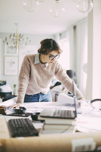 Woman working on table