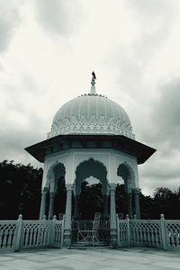 View of building against cloudy sky