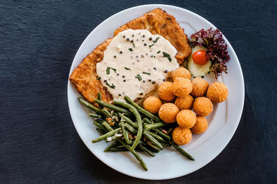 High angle view of breakfast served on table