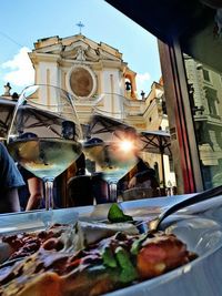 Low angle view of food on table against sky