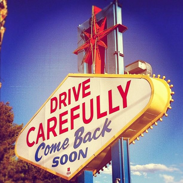 text, western script, communication, low angle view, sign, information sign, guidance, road sign, information, capital letter, clear sky, non-western script, blue, red, built structure, warning sign, architecture, sky, direction, arrow symbol