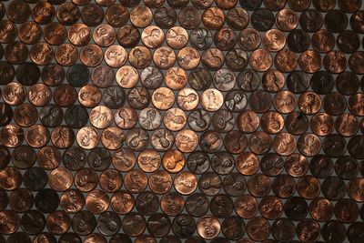 Close-up of coins on table