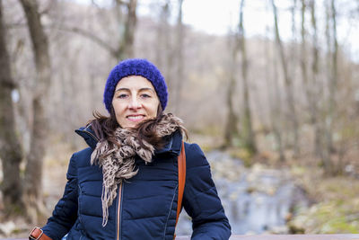 Portrait of woman in forest