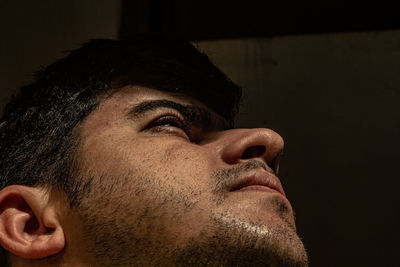 Close-up of man looking away