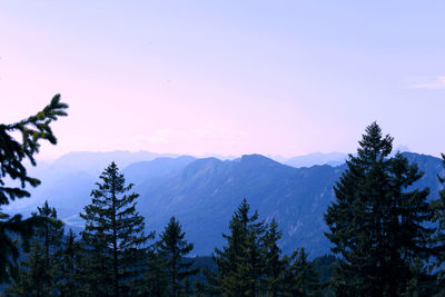 Scenic view of mountains against sky at sunset