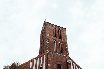 Low angle view of traditional building against sky