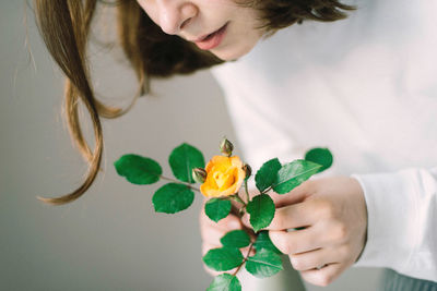 Young woman holding flower bouquet