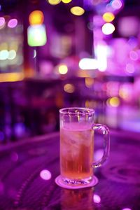 Close-up of beer glass on table