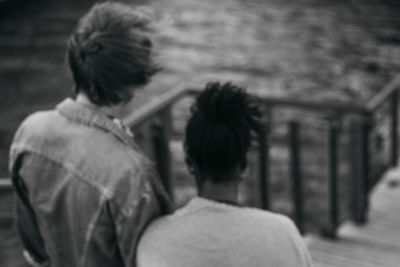 Rear view of couple walking outdoors