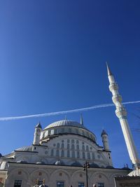 Low angle view of building against blue sky