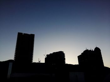 Low angle view of skyscrapers against sky