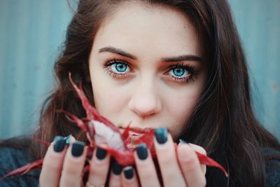 Close-up portrait of young woman