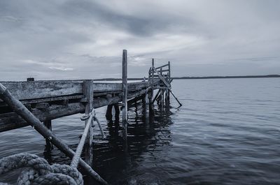 Pier over sea against sky