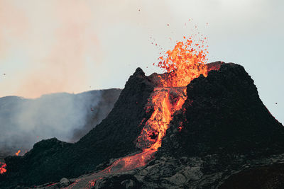 Panoramic view of volcanic mountain against sky