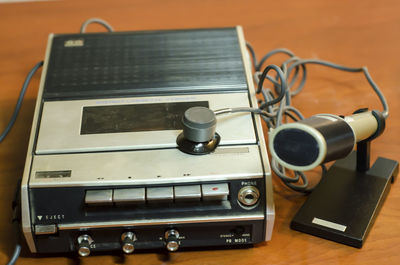 Close-up of audio equipment on table
