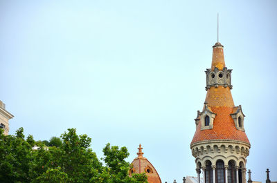 Low angle view of traditional building against clear sky