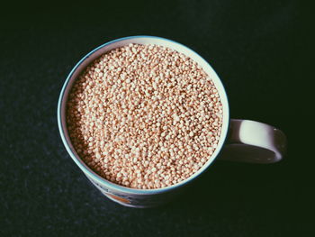 High angle view of coffee on table against black background