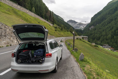 Car on road against mountain range