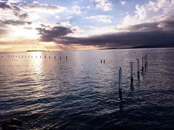 Scenic view of sea at sunset