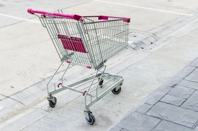 High angle view of shopping cart on footpath