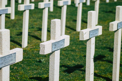 Close-up of cross on cemetery