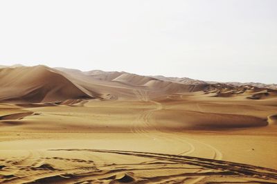 Scenic view of dessert against clear sky