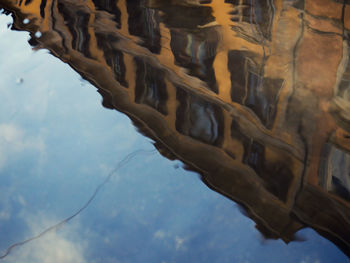 Reflection of clouds in swimming pool