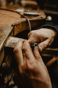 Close-up of man holding hands