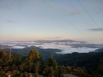 Scenic view of mountains against sky during sunset