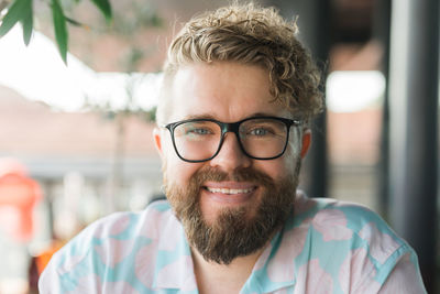 Portrait of young man wearing eyeglasses