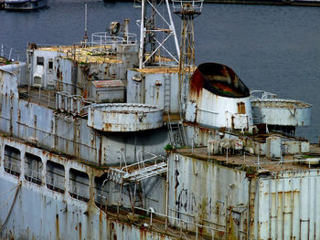 Boats moored at harbor