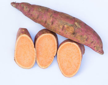 High angle view of bread against white background