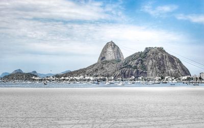 Panoramic view of beach against sky