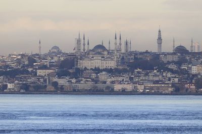 View of buildings in city at waterfront