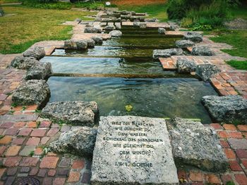 High angle view of stones on footpath