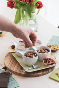 Midsection of man having breakfast