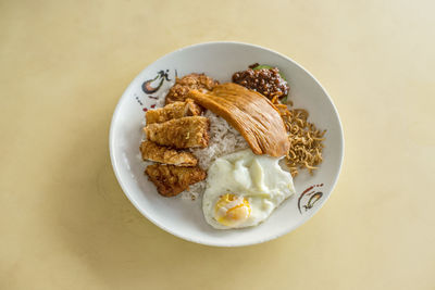 High angle view of breakfast served on table