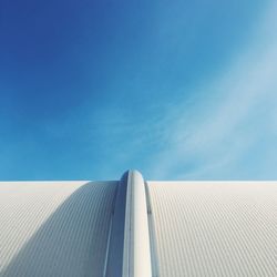 Low angle view of built structure against blue sky